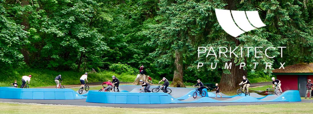 PARKITECT PUMP TRX logo over top of a pump track