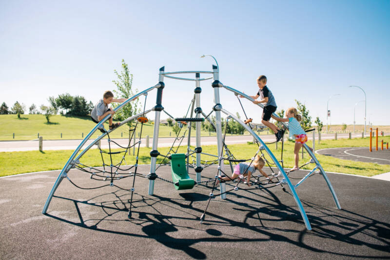 Children racing to the top of the Watermark Park Galaxy Climber
