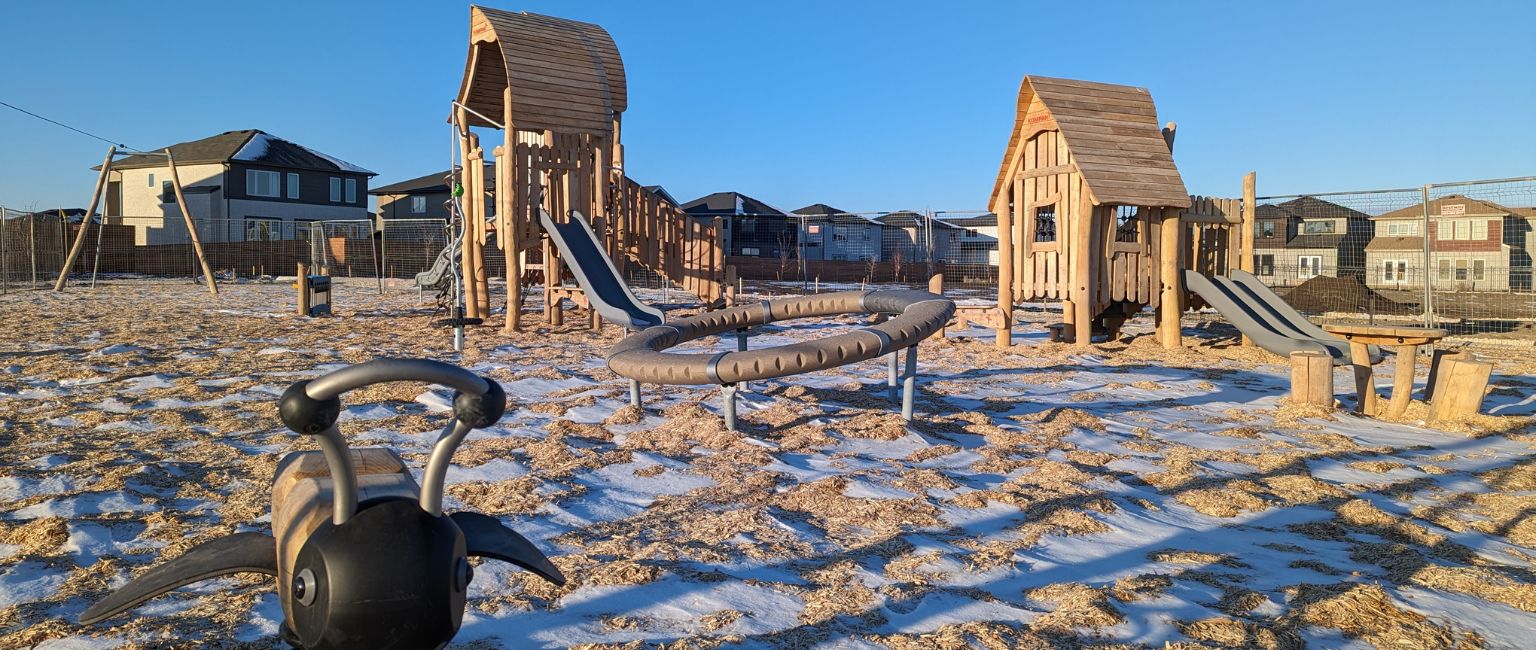 KOMPAN Robinia playground in the winter time with snow on the ground
