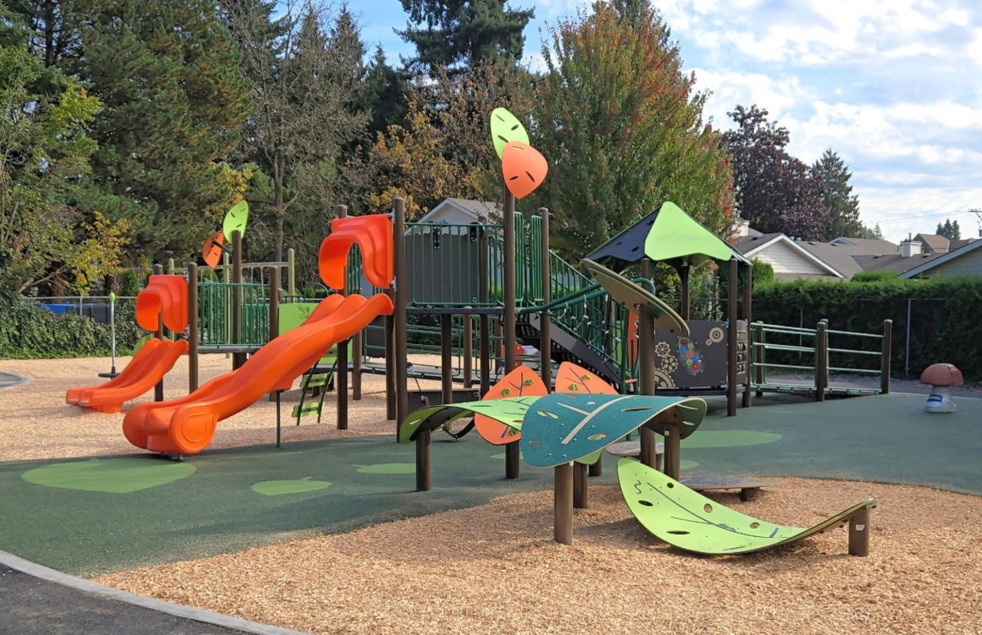Accessible and inclusive playground in Lions Fun Park located in Pitt Meadows, BC, Canada, featuring Jambette playground equipment