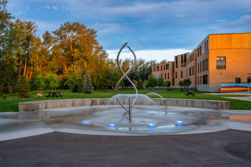 Daytime photo of the splash pad at the Okotoks Arts and Learning Campus
